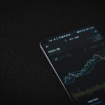 Passive income sources and investing using a smartphone where graphs are shown
