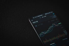 Passive income sources and investing using a smartphone where graphs are shown