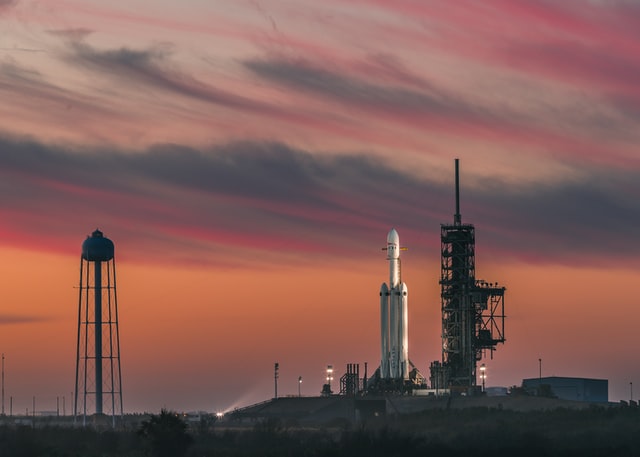 SpaceX launchpad with pink sky behind